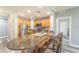 Modern kitchen with breakfast bar and stainless steel appliances at 7673 Heritage Crossing Way # 101, Reunion, FL 34747