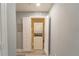 Compact laundry room with stackable washer and dryer at 7673 Heritage Crossing Way # 101, Reunion, FL 34747