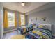 bedroom with two twin beds and Minions theme at 7673 Heritage Crossing Way # 101, Reunion, FL 34747