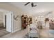 Spacious living area with comfortable seating and access to other rooms at 2877 Attwater Loop, Winter Haven, FL 33884