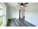 Bright bedroom with large window and ceiling fan at 51 Locust Crse, Ocala, FL 34472