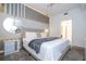Spacious bedroom with a king-size bed and en-suite bathroom at 3191 Paradox Cir # 102, Kissimmee, FL 34746