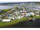 Aerial view of community with pool and lake at 3191 Paradox Cir # 102, Kissimmee, FL 34746