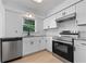 Modern kitchen with stainless steel appliances and granite countertops at 538 Windmeadows St, Altamonte Springs, FL 32701