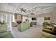 Community room with comfortable seating, fireplace, and high ceilings at 538 Windmeadows St, Altamonte Springs, FL 32701