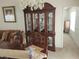 Formal dining room with wood table and hutch at 713 W 2Nd St, Lakeland, FL 33805