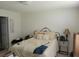 Bedroom with double bed and nightstand at 713 W 2Nd St, Lakeland, FL 33805