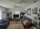 Living room with two brown sofas and a TV at 713 W 2Nd St, Lakeland, FL 33805