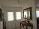 Entryway with mirror, console table, and double doors at 713 W 2Nd St, Lakeland, FL 33805