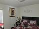 Bedroom with a double bed and floral bedding at 713 W 2Nd St, Lakeland, FL 33805