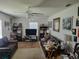 Living room with two brown sofas and a TV at 713 W 2Nd St, Lakeland, FL 33805
