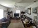 Living room with two brown sofas and a TV at 713 W 2Nd St, Lakeland, FL 33805