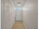 Hallway with built-in storage and access to exterior at 700 Melrose Ave # K32, Winter Park, FL 32789