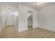 Clean entryway with wood-look floors and open view to living area at 700 Melrose Ave # K32, Winter Park, FL 32789