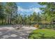 Peaceful pond-side patio with seating at 700 Melrose Ave # K32, Winter Park, FL 32789
