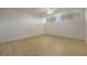 Bedroom with light flooring, ceiling fan, and window at 700 Melrose Ave # K32, Winter Park, FL 32789