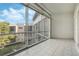 Lanai with sliding glass doors offering views of the building at 700 Melrose Ave # K32, Winter Park, FL 32789