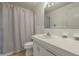 Simple bathroom with white vanity and shower/tub combo at 700 Melrose Ave # K32, Winter Park, FL 32789