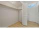 Large closet with shelving and bi-fold doors at 700 Melrose Ave # K32, Winter Park, FL 32789