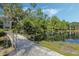 A scenic bridge over a tranquil pond at 700 Melrose Ave # K32, Winter Park, FL 32789