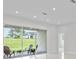 Living room with sliding glass doors leading to the patio at 169 Valencia Ridge Dr, Auburndale, FL 33823