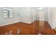 Clean hallway with hardwood floors and access to other rooms at 1338 Vassar St, Orlando, FL 32804