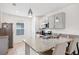 Modern kitchen with stainless steel appliances and granite countertops at 332 Charles Dr, Deland, FL 32724