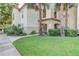 Condo building with walkway and lush landscaping at 823 Camargo Way # 101, Altamonte Springs, FL 32714