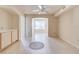 Living room with tile floors, ceiling fan and built-in shelving at 823 Camargo Way # 101, Altamonte Springs, FL 32714