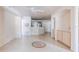 Open living room with kitchen view, tile floors and ceiling fan at 823 Camargo Way # 101, Altamonte Springs, FL 32714