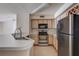 Kitchen with stainless steel appliances and breakfast bar at 823 Camargo Way # 101, Altamonte Springs, FL 32714