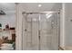 Clean bathroom with a shower stall and glass enclosure at 1624 Hawksbill Ln, Saint Cloud, FL 34771