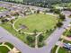 Community green space with gazebo and walking paths at 1624 Hawksbill Ln, Saint Cloud, FL 34771