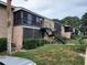 Two-story condo building with balconies and exterior stairs at 1181 Paseo Del Mar # D, Casselberry, FL 32707