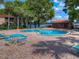 Relaxing community pool with patio furniture at 1181 Paseo Del Mar # D, Casselberry, FL 32707
