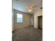Bedroom with carpeted floor and ceiling fan at 10420 Kiplinger Ln # 238, Orlando, FL 32829
