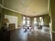 Community room with tables, chairs, and a relaxing atmosphere at 10420 Kiplinger Ln # 238, Orlando, FL 32829