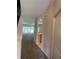 Hallway view shows access to living room, kitchen, and other rooms at 10420 Kiplinger Ln # 238, Orlando, FL 32829