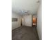Bright bedroom with carpeted floor and walk-in closet at 10420 Kiplinger Ln # 238, Orlando, FL 32829