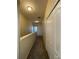 Upper hallway with carpet and neutral wall colors at 10420 Kiplinger Ln # 238, Orlando, FL 32829