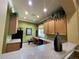 Community kitchen with ample counter space and cabinetry at 10420 Kiplinger Ln # 238, Orlando, FL 32829