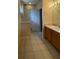 Bathroom with vanity, toilet and tub shower combo at 10420 Kiplinger Ln # 238, Orlando, FL 32829