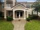 Two-story building exterior with inviting entryway and landscaping at 2323 Arbor Lakes Cir # 2323, Sanford, FL 32771