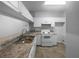 Modern kitchen featuring white cabinets and granite countertops at 2323 Arbor Lakes Cir # 2323, Sanford, FL 32771