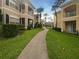 Landscaped community with walking paths and lush greenery at 2323 Arbor Lakes Cir # 2323, Sanford, FL 32771