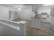 Updated kitchen with granite countertops and white cabinets at 2323 Arbor Lakes Cir # 2323, Sanford, FL 32771