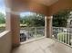 Private balcony overlooking a landscaped community at 2323 Arbor Lakes Cir # 2323, Sanford, FL 32771
