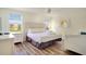 Bedroom with a queen bed and a twin bed at 491 Las Fuentes Dr, Kissimmee, FL 34746