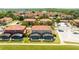 Aerial view of townhouses with private pools at 491 Las Fuentes Dr, Kissimmee, FL 34746