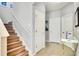 Stairway with wood-look laminate flooring at 491 Las Fuentes Dr, Kissimmee, FL 34746